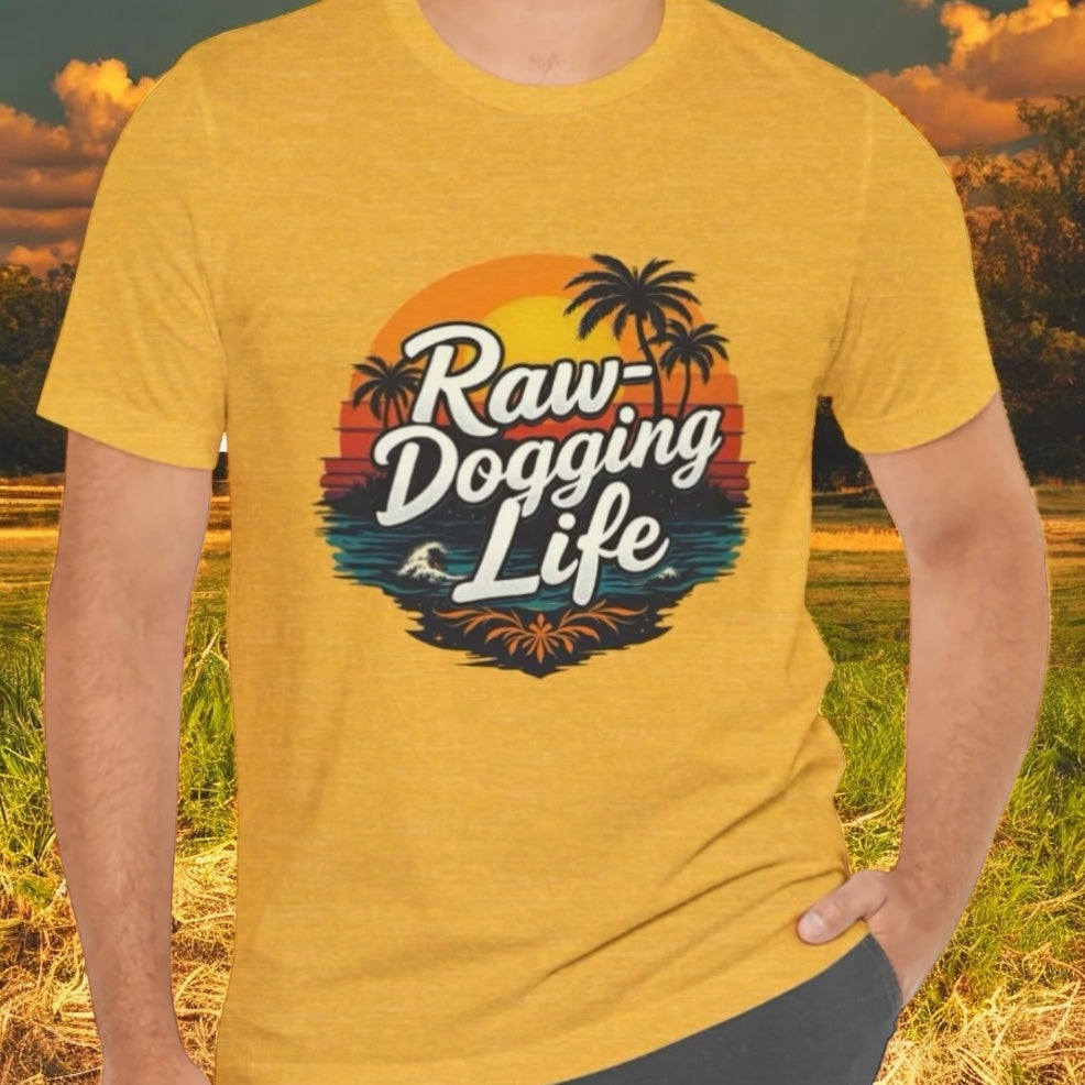 Person wearing a yellow t-shirt with 'Raw-Dogging Life' design, by Terribull Tees.