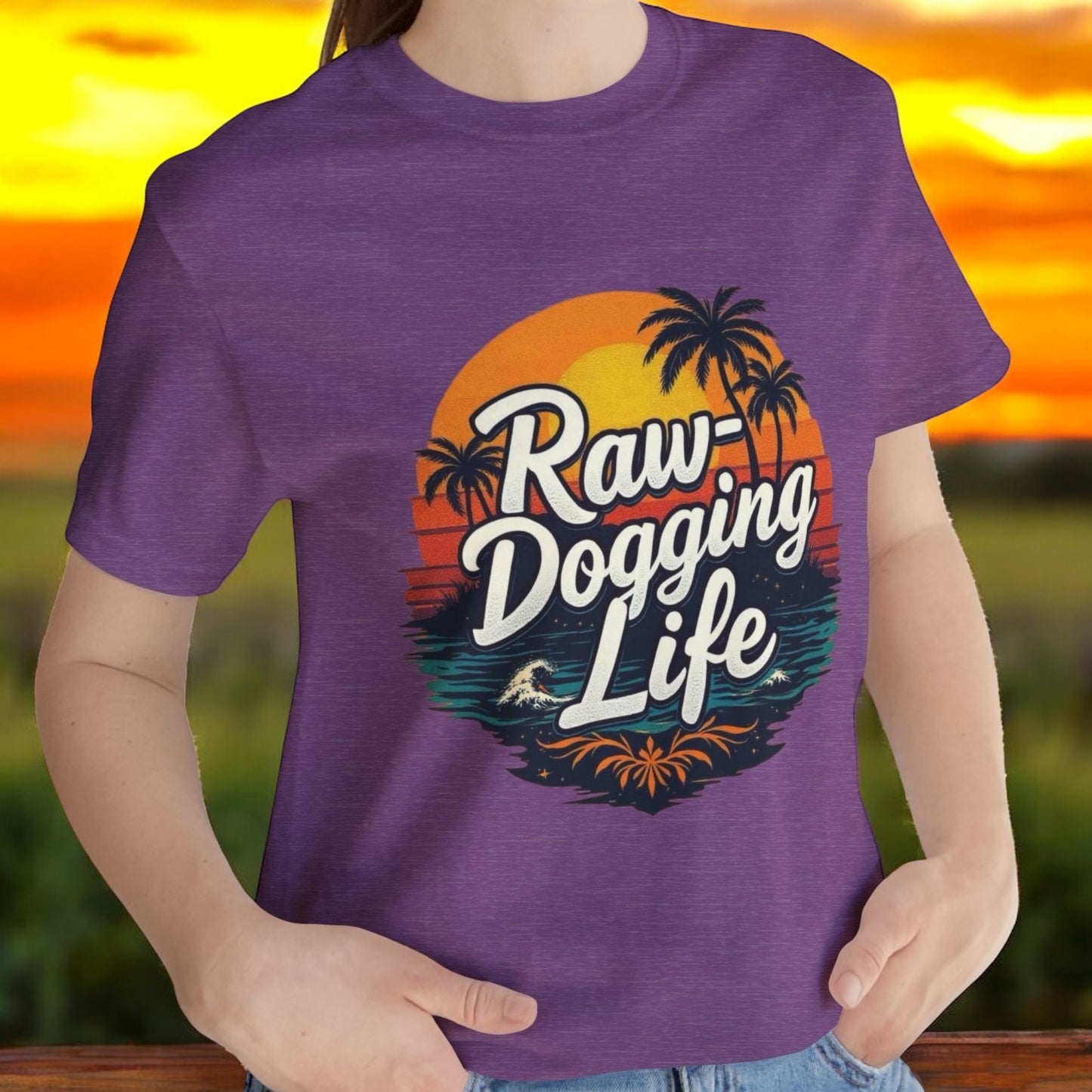 Purple t-shirt with 'Raw-Dogging Life' graphic design, by Terribull Tees.