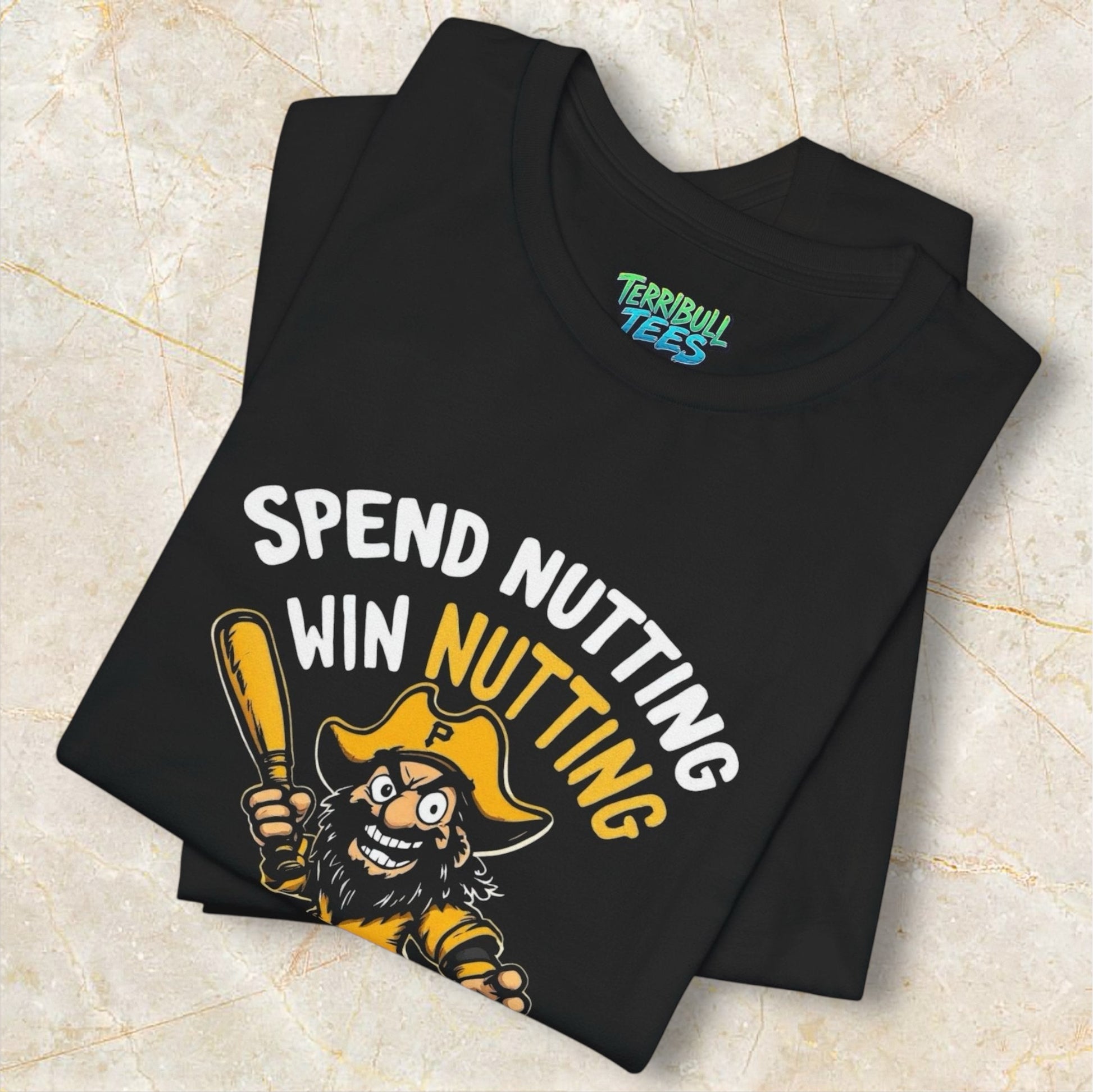 Black shirt with a graphic design and text 'Spend Nuttin Win Nutting' by Terribull Tees.